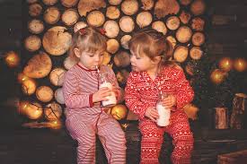 One child asking the other for milk