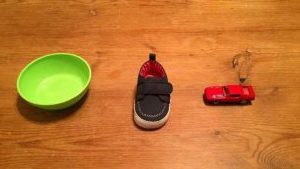 a bowl, a shoe, and a toy car
