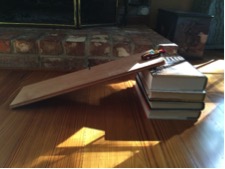 A ramp made from a few books and a flat board