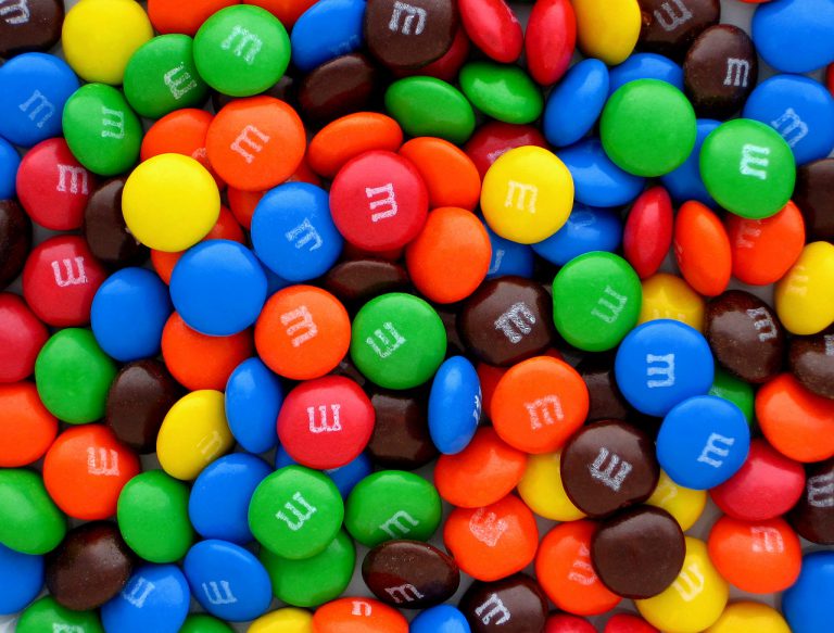 a pile of M&Ms candies